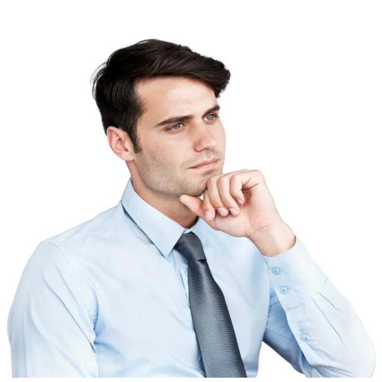 Thoughtful CFA candidate reflecting at desk with hand on chin
