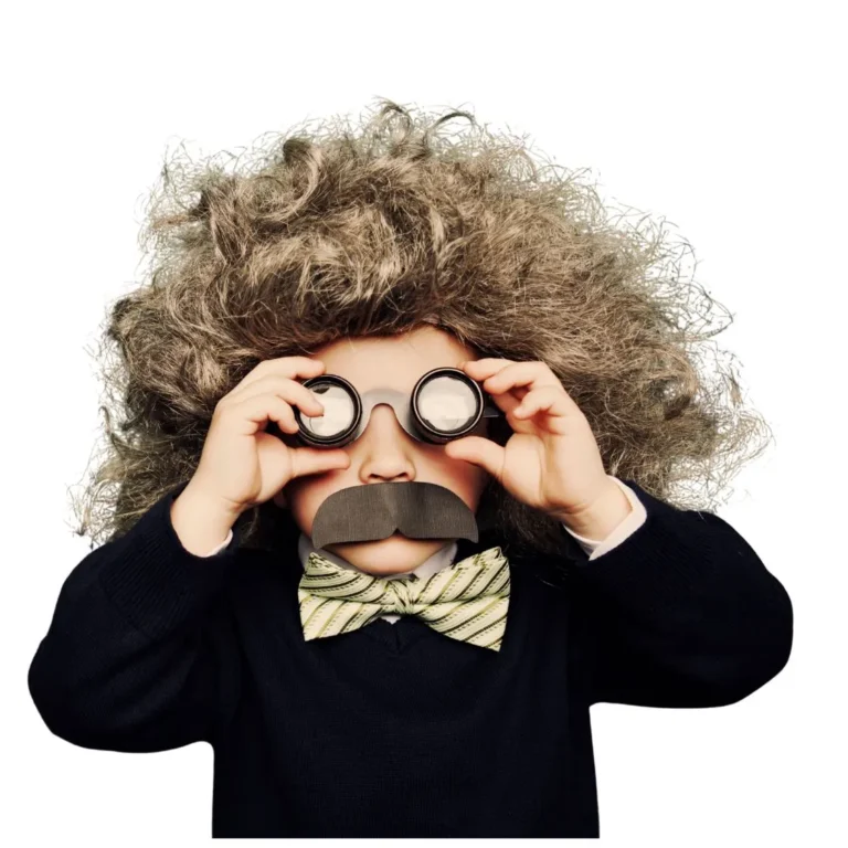 Child dressed as a wild-haired genius with bowtie and fake mustache